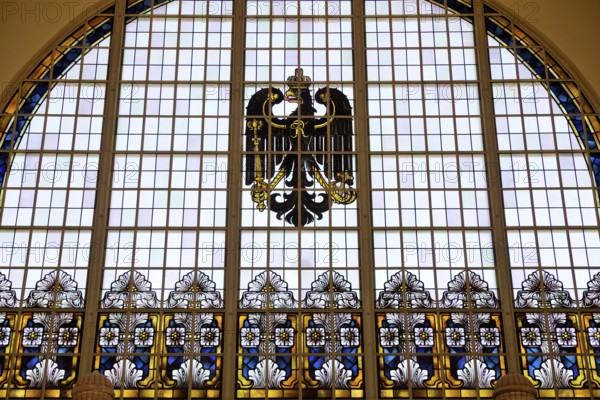 A stained glass window in the railway station with an imperial eagle is a reminder of the imperial era of Wilhelm II in Bad Homburg vor der Höhe, Hesse, Germany, Europe