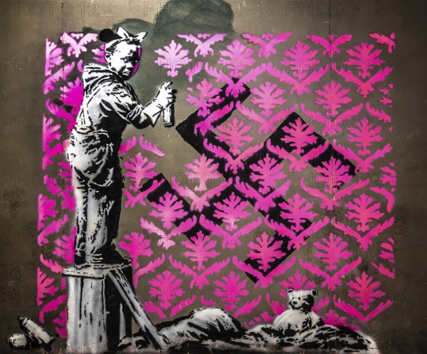 Banksy - Migrant Soup Citchen, Girl trying to remove a swastika, protest against injustice towards refugees, 2018, Porte de la Chapelle, Paris, France, exhibition The World of Banksy, Europe