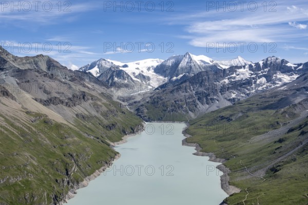 Blue mountain lake in a mountain landscape with glaciers, Lac des Dix reservoir and Mont Blanc de Cheilon peak, Valais Alps, Valais, Switzerland, Europe