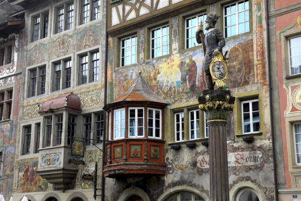 Soldier figure on the market fountain, house facade with facade painting in the old town, Stein am Rhein, Canton Schaffhausen, Switzerland, Europe