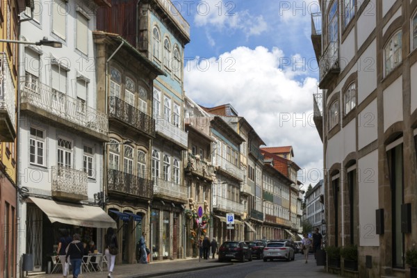 Shops in historic buildings, Rua de Santa Antonio, city centre Guimaraes, northern Portugal