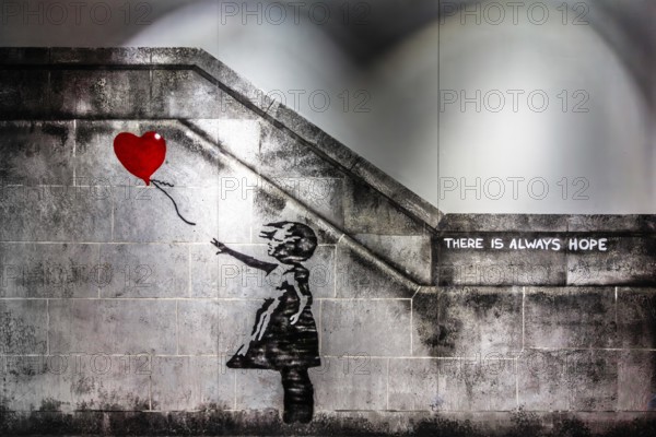 Banksy - Girl with Balloon, There is always hope, 2002, Southbank, London, exhibition The World of Banksy