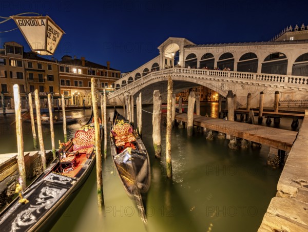 Rialto Bridge and gondolas on the Grand Canal, blue hour, long exposure, Venice, Veneto, Italy, Europe