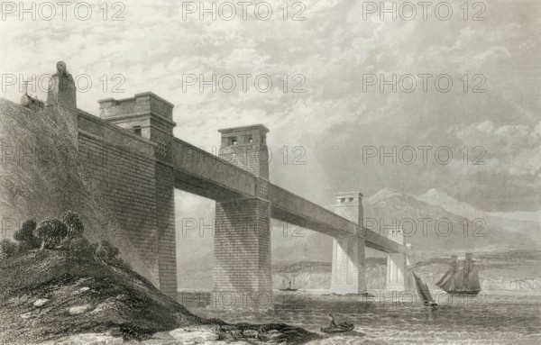 The Britannia cane bridge across the Menai Strait between the Isle of Anglesey and the Welsh mainland in the 19th century. From the Cyclopaedia of Useful Arts and Manufactures by Charles Tomlinson, digital reproduction of a historical model