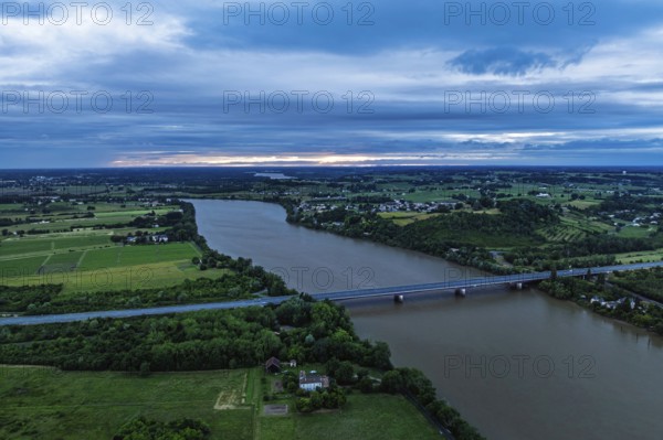 Twilight over bridge and filekds in Libourne from a drone, Gironde, Nouvelle-Aquitaine, Saint-Émilion and Pomerol, Southwestern France
