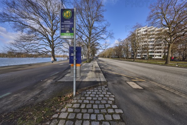 Bus stop Maschsee - Altenbekener Damm, bare wintry trees, general architecture, residential building, high-rise building, Maschsee, lake, blue sky, cumulus clouds, street Rudolf-von-Bennigsen-Ufer, Hanover, state capital, Hanover region, Lower Saxony, Germany, Europe