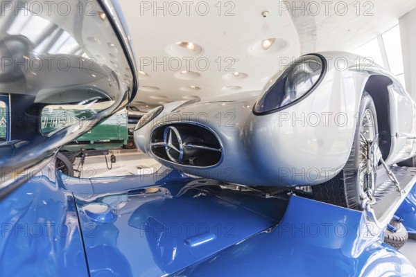 Mercedes-Benz racing car fast transporter from 1955 with 300 SLR racing car. The Mercedes-Benz Museum in Stuttgart presents a journey through the automotive history of the global corporation. The history of the Mercedes star begins with the first automobile in 1886. 160 vehicles are on display. Stuttgart, Baden-Württemberg, Germany, Europe