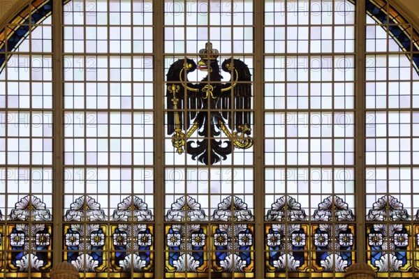A stained glass window in the railway station with an imperial eagle is a reminder of the imperial era of Wilhelm II in Bad Homburg vor der Höhe, Hesse, Germany, Europe