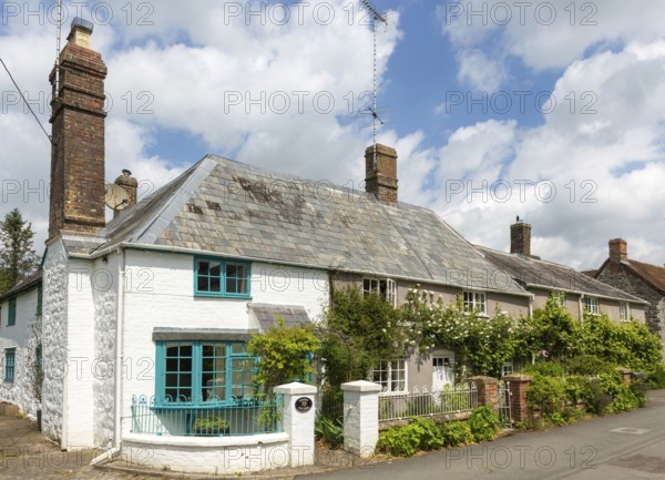 Attractive historic cottages in village of Avebury, Wiltshire, England, UK