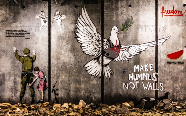 Banksy - The Separation Barrier and Bethlehem Murals, barrier between Israel and the occupied West Bank with peace dove with protective waistcoat, 2005, Bethlehem, exhibition The World of Banksy