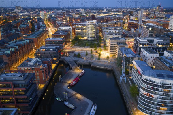 Aerial view of the Speicherstadt Hamburg with Magellan Terraces at Sandtor harbour at blue hour, Hamburg, Germany, Europe