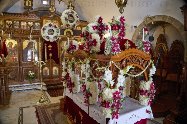 Epitaphios, Church of Agios Ioannis Prodromos, Detailed decorated altar in an orthodox church with floral decorations, Skala, harbour, Patmos, Dodecanese, Greek Islands, Greece, Europe