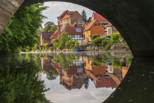 View through the Werra bridge to the old fishermen's settlement along the Werra, Bad Sooden, Allendorf, Allendorf district, Fischerstad street under monument protection, half-timbered houses, water reflection, trees, Werra-Meissner district, Hesse, Germany, Europe