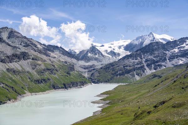 Blue mountain lake in a mountain landscape with glaciers, Lac des Dix reservoir and Mont Blanc de Cheilon peak, Valais Alps, Valais, Switzerland, Europe