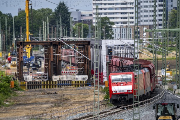 Reconstruction, extension of the Emmerich-Oberhausen railway line, three tracks, including 47 new or adapted bridges, here the new construction of railway bridges over the Lippe near Wesel, currently only 1 track in operation, goods train, the old bridges are replaced by new ones, extension of the Dutch Betuwe line from the port of Rotterdam, part of the European freight transport corridor Rotterdam-Genoa, 1300 KM long, Wesel, North Rhine-Westphalia, Germany, Europe
