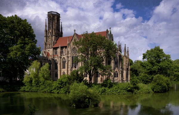 Johanneskirche, Feuersee, water is green from blue-green algae, Stuttgart-West, Stuttgart, Baden-Württemberg, Germany, Europe