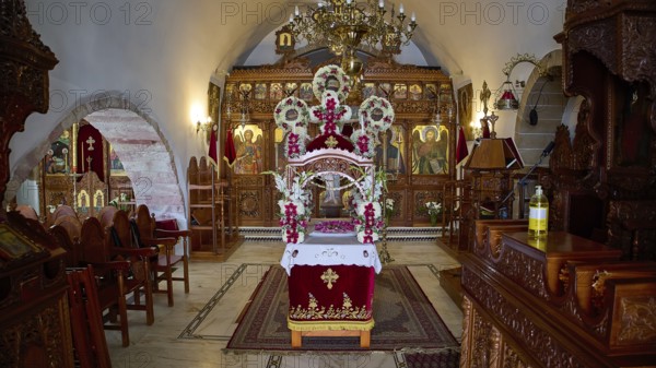 Epitaphios, Church of Agios Ioannis Prodromos, Magnificently decorated orthodox church interior with icons and floral decoration, Skala, harbour, Patmos, Dodecanese, Greek Islands, Greece, Europe