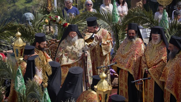 Orthodox priests in splendid robes hold a solemn ceremony with golden elements and palms, Orthodox ceremony, monks of St John's Monastery, ceremonial washing of feet, procession, Maundy Thursday, Megali Pempti, Chora, Patmos, Dodecanese, Greek Islands, Greece, Europe