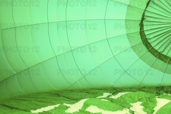 Preparation for hot air ballooning, Walchsee, Unterinntal, Tyrol, Austria, Europe