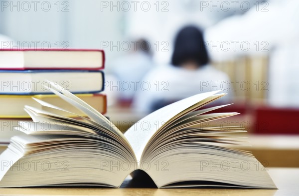 Books lying on the table in the public library