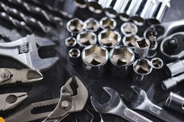 Composition with a variety of metal tools