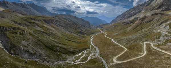 Ascent to Colle Sommeiller, also Col du Sommeiller, Mont-Cenis massif, Rough gravel road in the Piedmont Alps, Italian-French border area, Bardonecchia, Piedmont, Italy, Europe