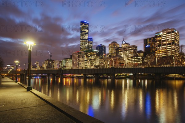 Melbourne, Australia, July 2 2013: Melbourne skyline along the Yarra River at dusk in Victoria Australia, Oceania