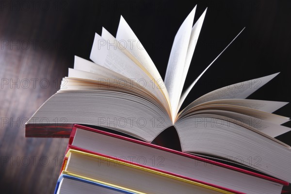 Composition with open book on the table
