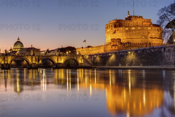 Castel Sant'Angelo and St Peter's Basilica in Rome at dusk