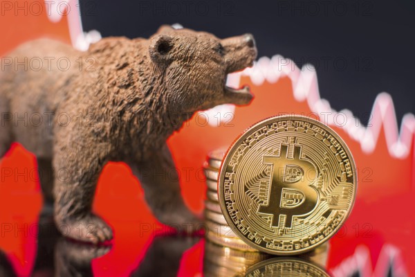 Bitcoin with a red chart drop. Price crash and bear market trend concept