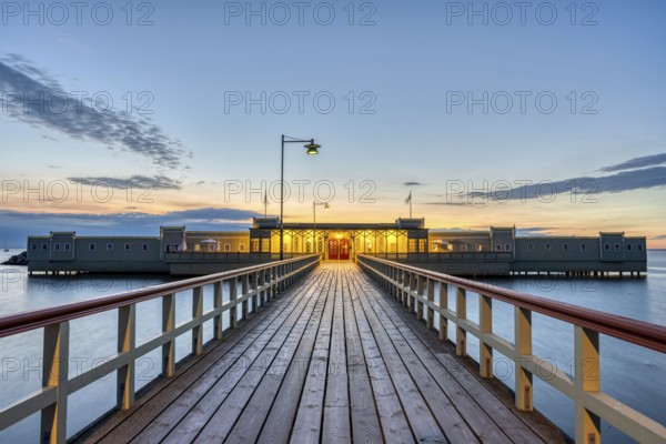 The pier and Ribersborg Kallbadhus in Malmö after sunset