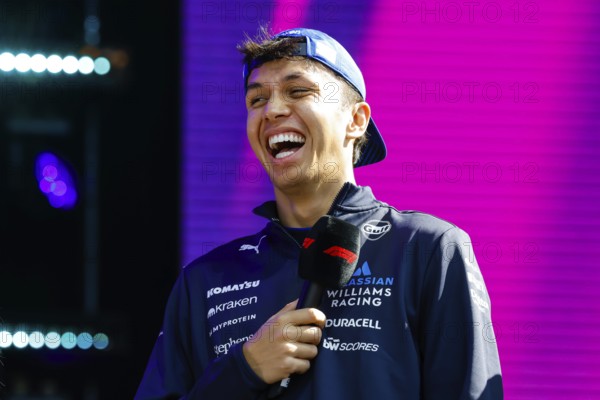 MELBOURNE, AUSTRALIA - MARCH 14: Alexander Albon of Thailand and Williams Racing at a fan forum at the 2025 Australian Grand Prix at Albert Park in Melbourne, Australia, Oceania