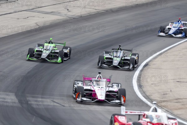 NTT INDYCAR SERIES driver, ROMAIN GROSJEAN (77) of Geneva, Switzerland races through the turns during the Hy-Vee One Step 250 at Iowa Speedway in Newton, IA