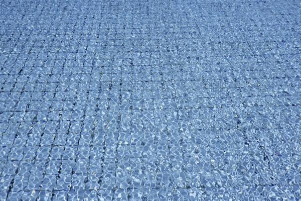 Blue tiles pool water waves perspective summer background
