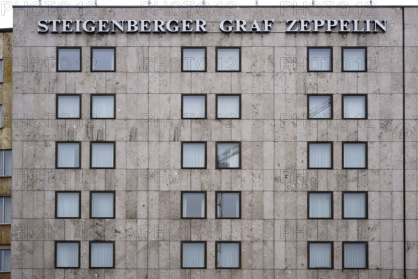 Stuttgart, Germany - February 03, 2018: The striking façade with square rows of windows of the Steigenberger Graf Zeppelin luxury hotel in Stuttgart on 03 February 2018