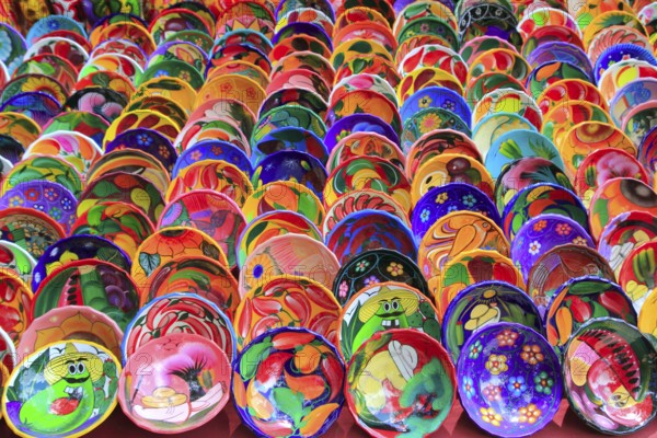 Clay ceramic colorful plates from Mexico traditional handcrafts