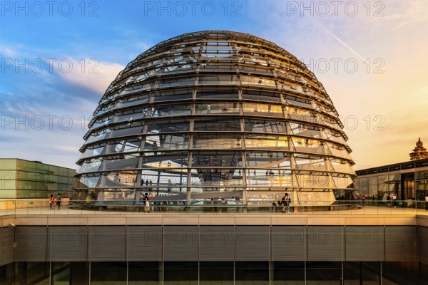 Berlin, Germany, July 28, 2019: View of the dome of Reichstag building, seat of the German Parliament. View at sunset, Europe