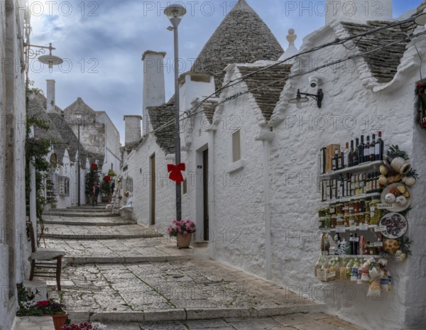 Alberobello, Italy, 2 December, 2023: souvenir shop woth local specialities in the Rione Monti District of Alberobello, Europe