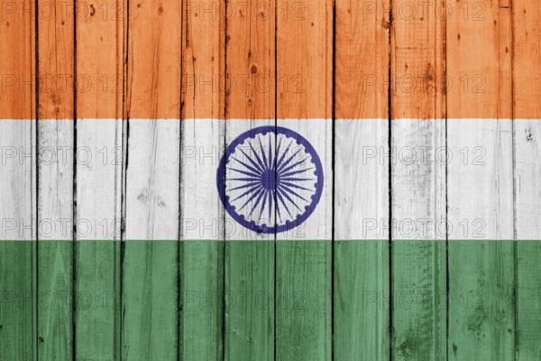 The Indian flag painted on a wooden fence