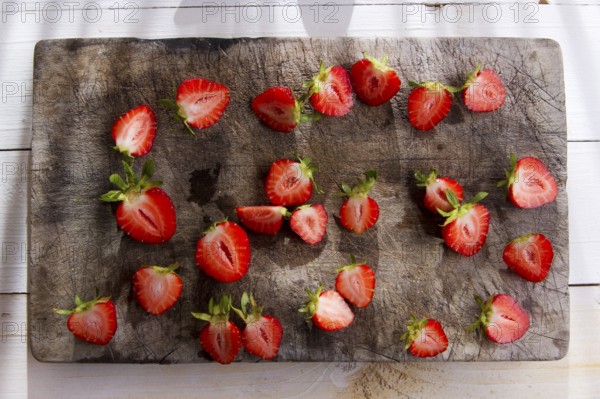 Small pieces of strawberries for the preparation of salad