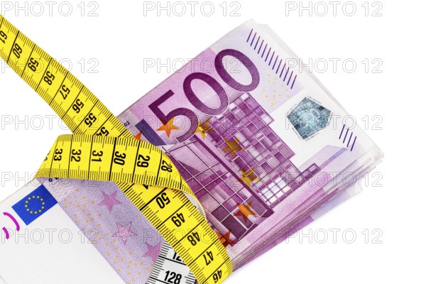 Banknotes and tape measure, symbolic photo for austerity measures, budget consolidation and controlling Austria