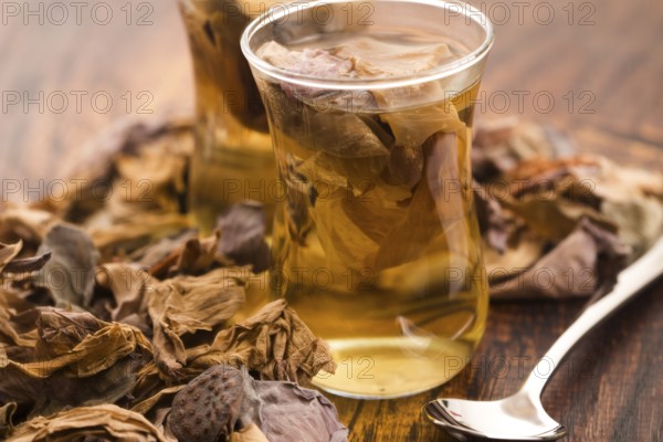 Lotus petals tea on wooden background