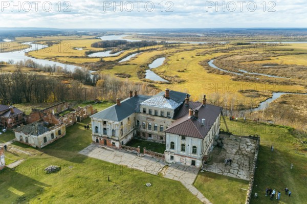 Manor house of Priklonsky Rukavishnikovs on Oka river. Aerial drone view of historical residence of Rukavishnikov merchant on old Murom tract. Popular tourist place in Podvyaze, Nizhny Novgorod region
