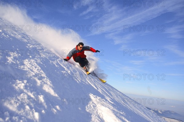 Skiers in action, Alps, Austria, Europe