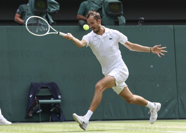 Russian tennis player Daniil Medvedev in action at the 2024 Wimbledon Championships, London, England, United Kingdom, Europe