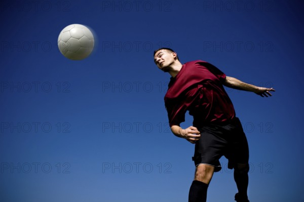 Soccer or football player in action