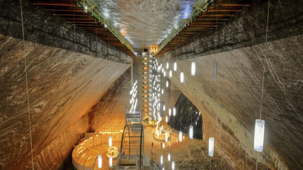 A look inside the historic Salina Turda salt mine with lights in Romania