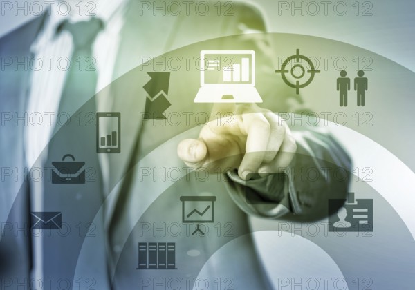 Close up of businessman touching icon of media screen