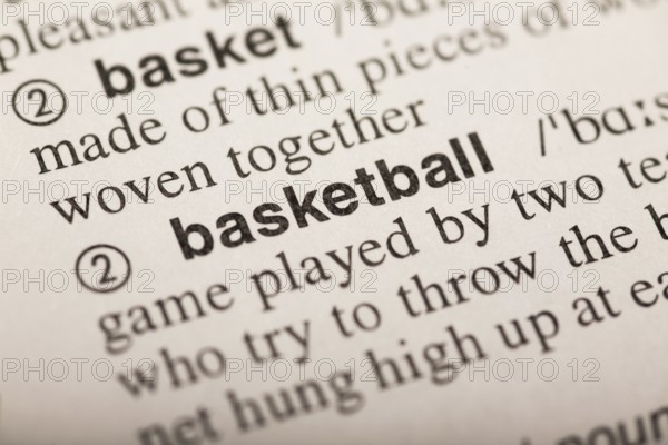 Basketball, word in dictionary. macro shot. selective focus