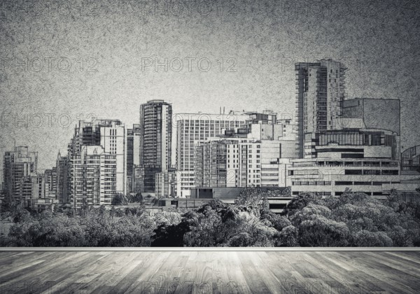Silhouette of modern city landscape drawn on concrete wall